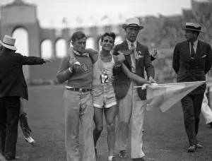 Crying Prints: Runner Carries Flag After Olympic Marathon