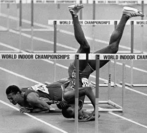 Runner Tumbles Headfirst Over Hurdles
