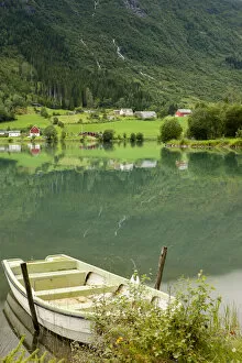 Images Dated 23rd July 2011: Rural scene with rowboat on lake, Olden, Norway