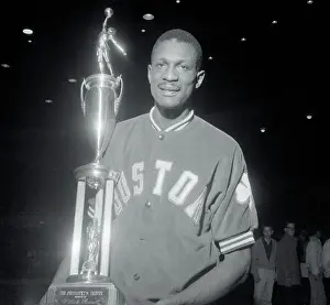 Bill Rusell Holding Trophy