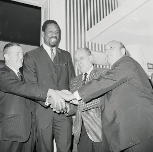 Bill Russell Prints: Bill Russell Joining Hands with Officials