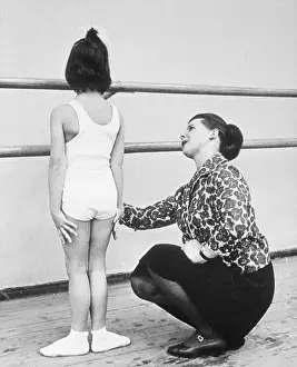 Russian Ballet Teacher with Young Female Student
