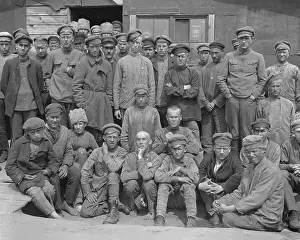 Shack Prints: Russian Laborers Pose In Front Of Shed
