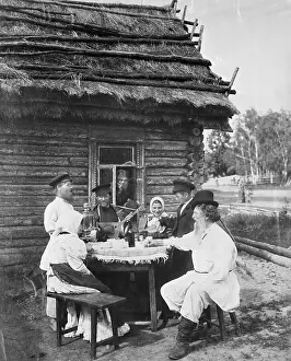 Log Cabin Prints: Russian Peasants at Table Outside