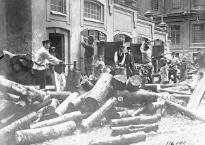 Russians Cutting Logs for Mill