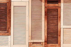 Rustic Wooden Shutter Panels in Warm Earth Tones for Interior Decor. Demonstrating Mocha color - trendy color of the year 2025