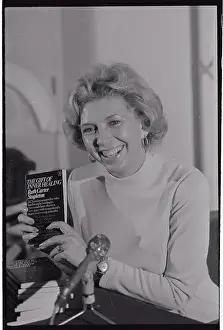 Ruth Stapleton Holding Her Published Book