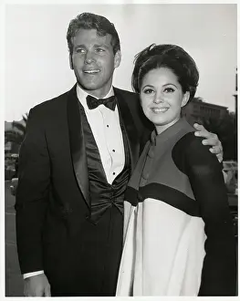 Ryan Oneal Prints: Ryan O'Neal Accompanied by Date