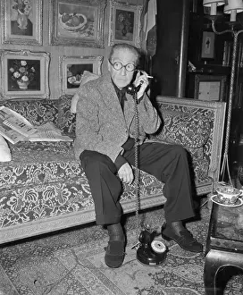 Sacha Guitry Talking on Telephone