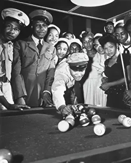 Sailor Shooting Pool at USO Club