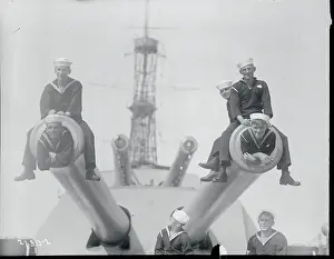 Sailor Sitting on Guns