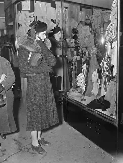 Salesperson Prints: Sales Clerk in Coat Window Shops