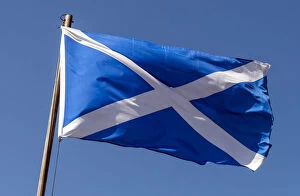 Ensign Gallery: The Saltire, Scottish flag, flying against a blue sky, Oban, Scotland, United Kingdom