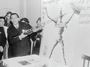 Salvador Dali Displaying Don Quixote Illustration