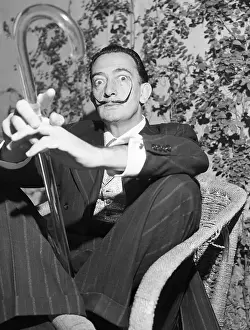 Salvador Dali Holding Glass Walking Stick