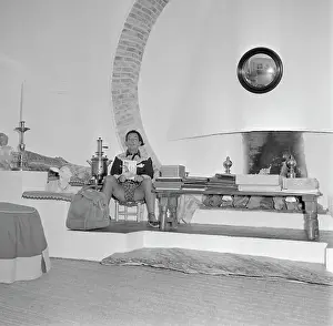 Salvador Dali Lounging in His Living Room