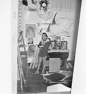 Salvador Dali Standing Near His Art Work