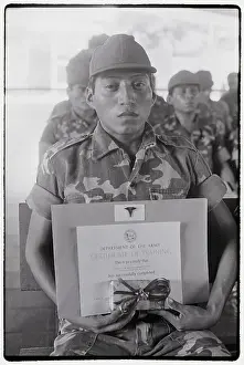 Salvadoran Army Medic Displays Diploma