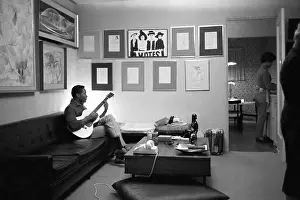 Prints of Sam Cooke plays guitar on November 30, 1960 in Los Angeles, California. (Photo by Jess Rand/Michael Ochs Archives/Getty Images) The man known as the King of Soul: Sam Cooke Portrait Session