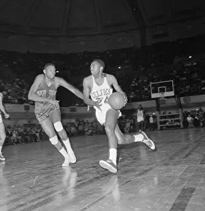 Sam Jones Dribbling Past Bob Boozer