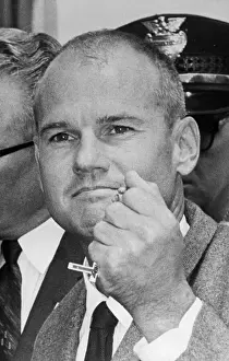 Columbus Prints: Sam Sheppard Holding Rosary Beads