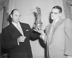 Sam Snead and Dale Bourisseau Looking at Trophy