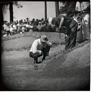 Sam Snead Examining Golf Ball Embedded in Course