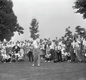 Sam Snead Tees Off-Swinging-Crowd Behind