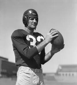 Football Uniform Prints: Sammy Baugh Holding a Football