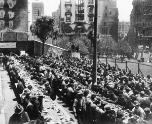 Prints of Crowds of male survivors of the 1906 San Francisco earthquake and citywide fires sit at tables and eat in an outdoor soup kitchen, San Francisco, California, 1906 Urban Echoes of America’s Golden Age: San Francisco Soup Kitchen