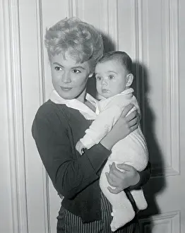 Sandra Dee Holding Baby