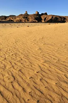 Algerian Prints: Sandstone rock formation and dunes on Tasset Plateau