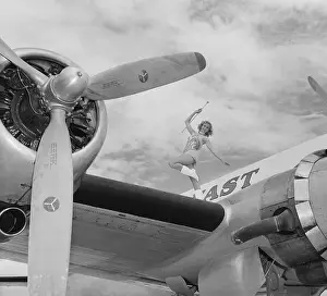 Propeller Prints: Sandy Wirth Twirling Baton on Top of Airplane