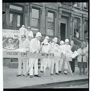 Sanitation Workers Cleaning a Street