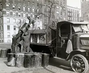 Lifting Prints: Sanitation Workers Lifting Garbage Can