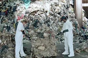 Waste Prints: Sanitation Workers Picking Through Trash Heap