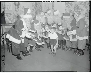 Poliomyelitis Prints: Santa Clauses Offering Presents to Anthony Ventura