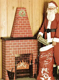 Artificial Prints: Santa with Gifts Outside a Paper Chimney