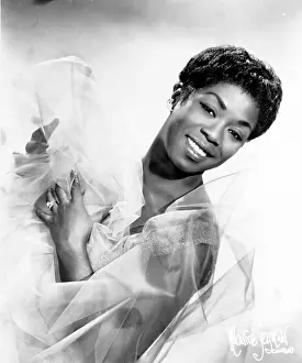 Prints of CHICAGO IL - CIRCA 1957: Sarah Vaughan poses for a portrait circa 1957 in Chicago, Illinois. (Photo by Maurice Seymour/Michael Ochs Archive/Getty Images) The Divine One: Sarah Vaughan