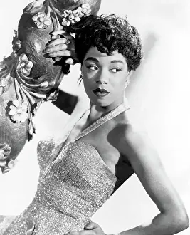 Prints of NEW YORK - CIRCA 1950: Singer Sarah Vaughan, who possessed one of the finest vocal instruments in the history of jazz, poses for a publicity shot circa 1950in New York, New York The Divine One: Sarah Vaughan