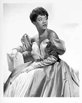 Prints of NEW YORK - CIRCA 1950: Singer Sarah Vaughan, who possessed one of the finest vocal instruments in the history of jazz, poses for a publicity shot circa 1950 in New York, New York The Divine One: Sarah Vaughan