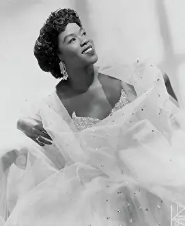 Prints of NEW YORK - CIRCA 1950: Singer Sarah Vaughan, who possessed one of the finest vocal instruments in the history of jazz, poses for a publicity shot circa 1950 in New York, New York The Divine One: Sarah Vaughan