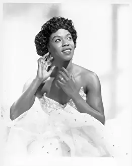 Prints of NEW YORK - CIRCA 1950: Singer Sarah Vaughan, who possessed one of the finest vocal instruments in the history of jazz, poses for a publicity shot circa 1950 in New York, New York The Divine One: Sarah Vaughan