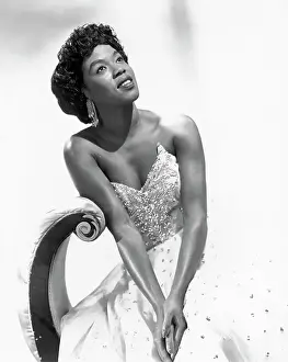 Prints of NEW YORK - CIRCA 1950: Singer Sarah Vaughan, who possessed one of the finest vocal instruments in the history of jazz, poses for a publicity shot circa 1950 in New York, New York The Divine One: Sarah Vaughan