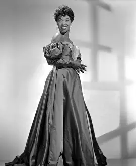 Prints of NEW YORK - CIRCA 1950: Singer Sarah Vaughan, who possessed one of the finest vocal instruments in the history of jazz, poses for a publicity shot circa 1950 in New York, New York The Divine One: Sarah Vaughan