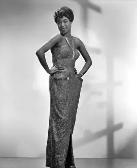 Prints of NEW YORK - CIRCA 1950: Singer Sarah Vaughan, who possessed one of the finest vocal instruments in the history of jazz, poses for a publicity shot circa 1950in New York, New York The Divine One: Sarah Vaughan