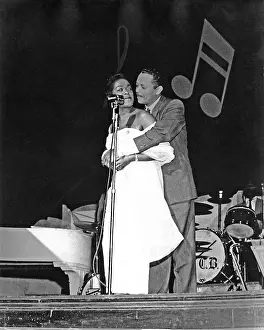 Prints of CIRCA 1955: Jazz singers Sarah Vaughan and Billy Eckstine perform with the Count Basie Orchestra circa 1955. (Photo by Michael Ochs Archives/Getty Images) The Divine One: Sarah Vaughan And Billy Eckstine