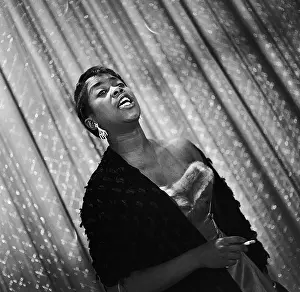 Prints of NEW YORK - MARCH 20, 1955: Singer Sarah Vaughan performs a song on the Ed Sullivan Show on March 20, 1955, in New York, New York. (Photo by Steve Oroz/Michael Ochs Archives/Getty Images) The Divine One: Sarah Vaughan On The Ed Sullivan Show