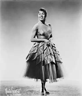 Prints of CHICAGO IL - CIRCA 1955: Sarah Vaughan poses for a portrait circa 1955 in Chicago, Illinois. (Photo by Maurice Seymour/Michael Ochs Archive/Getty Images) The Divine One: Sarah Vaughan Portrait Session