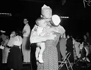 Reunion Prints: Sargeant Is Greeted By Wife And Son
